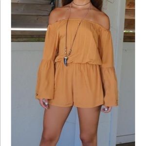 She & Sky marigold bell sleeve romper.